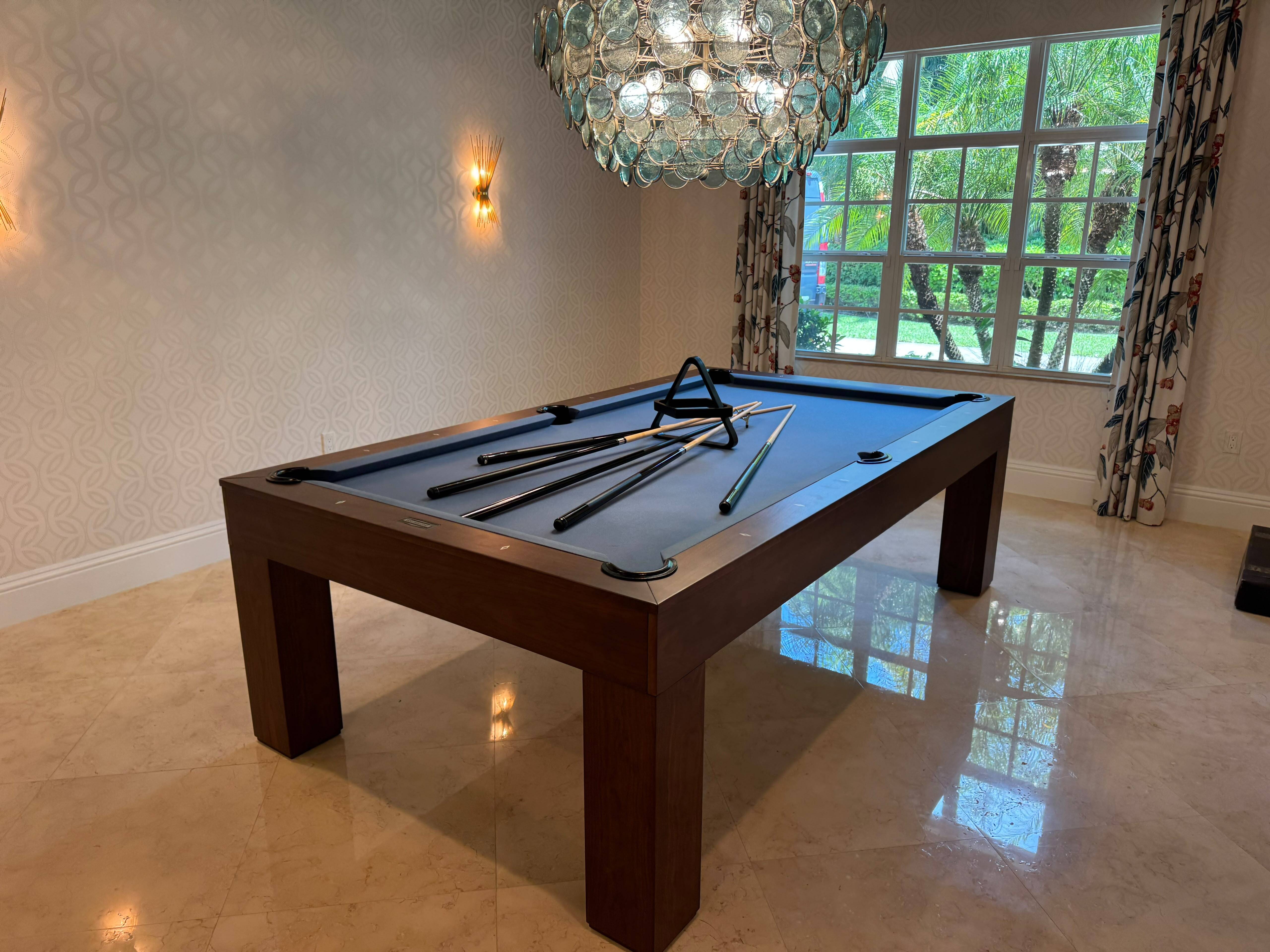 Doc & Holliday Paula Parsons natural walnut pool table in a completed residential game room