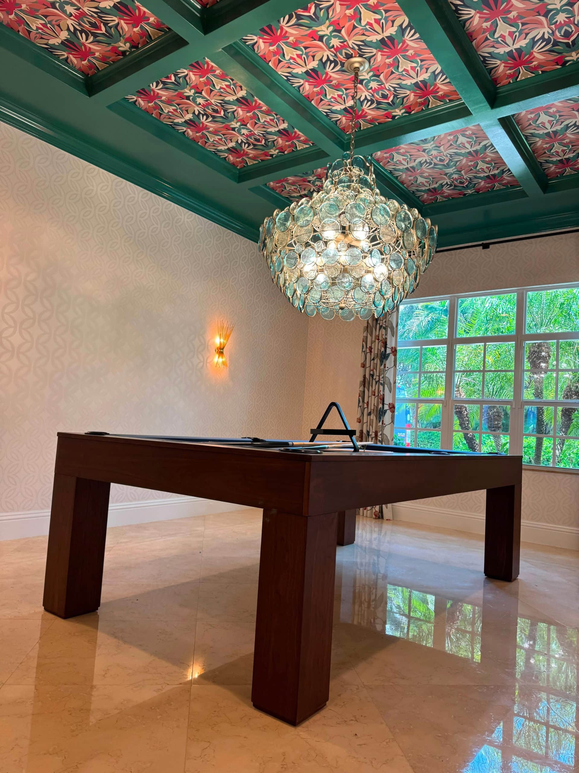 Doc & Holliday Paula Parsons pool table in natural walnut beneath a patterned ceiling in a designer residence