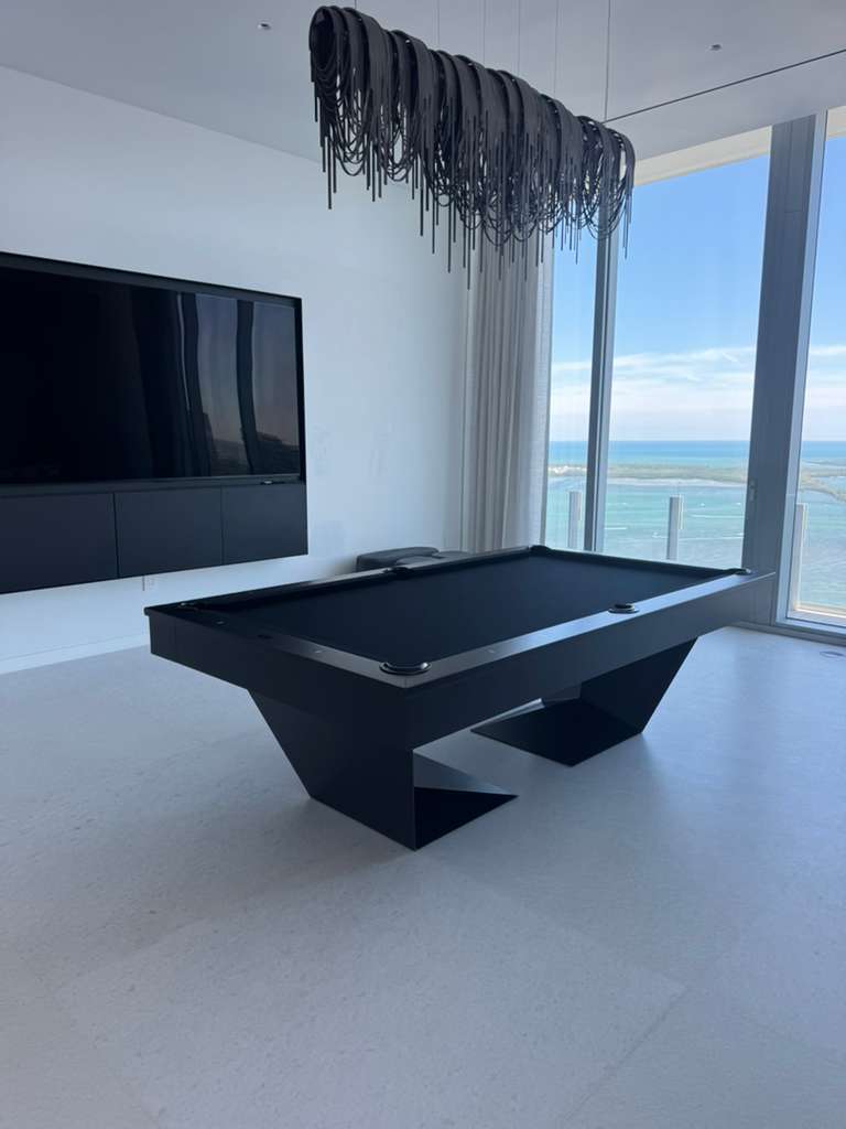 Doc & Holliday Tron steel pool table in a contemporary interior