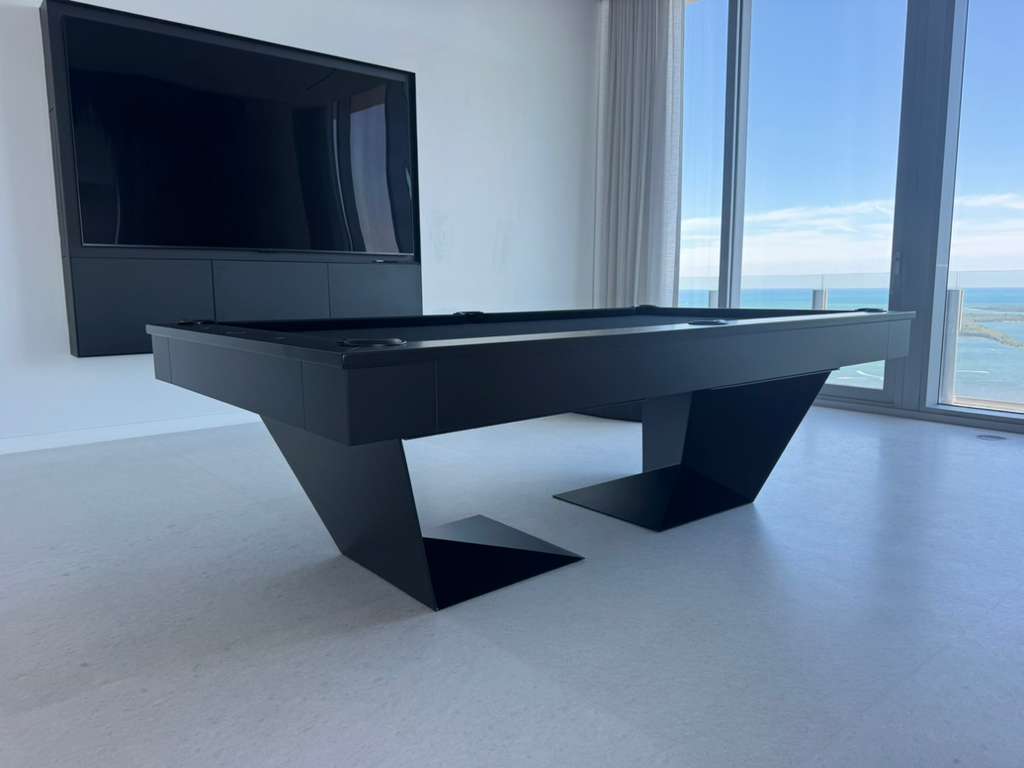 Doc & Holliday Tron steel pool table in a completed project